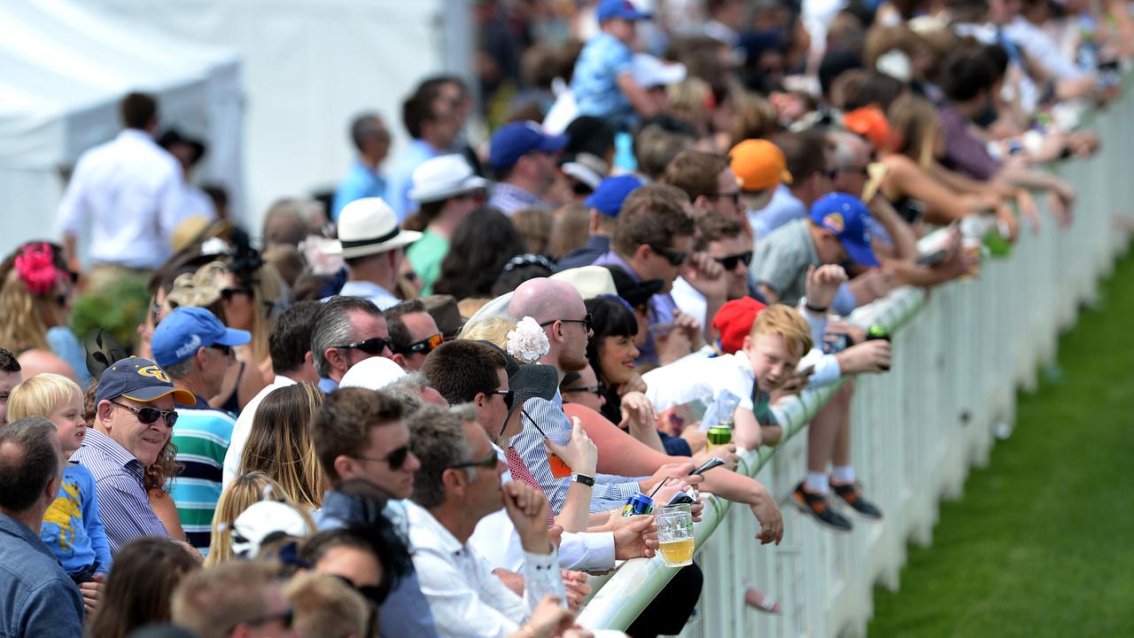 Yarra Valley Racing's Melbourne Cup Day event at Yarra Glen. The barrier along the main straight is lined with patrons enjoying very pleasant conditions at the cup day event. Picture: Steve Tanner