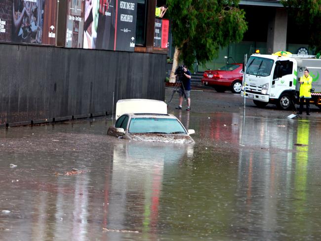 Flooding in Alexandra St, Bowen Hills on Wednesday afternoon. Photo: Chris McCormack.
