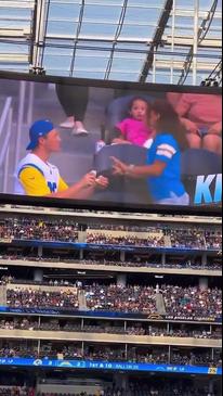 Kiss cam proposal goes horribly wrong at NFL game