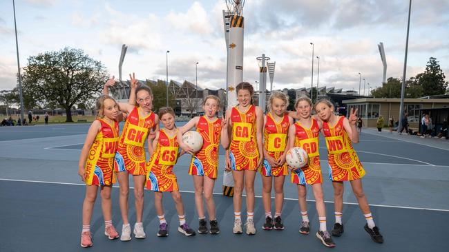 Surf Coast Suns Bremlea under-11 netball team pull their funniest faces.