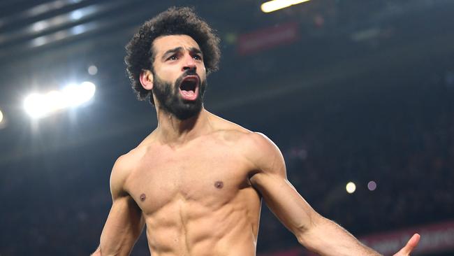 LIVERPOOL, ENGLAND - JANUARY 19: Mohamed Salah of Liverpool celebrates after scoring his team's second goal during the Premier League match between Liverpool FC and Manchester United at Anfield on January 19, 2020 in Liverpool, United Kingdom. (Photo by Michael Regan/Getty Images)