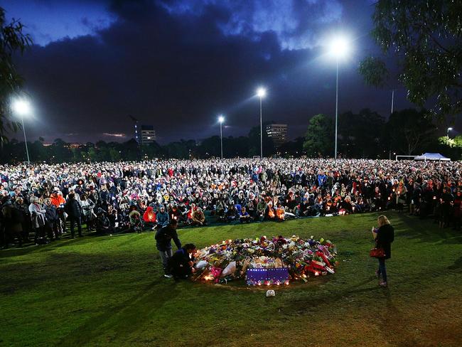 Thousands of mourners pay their respects during a vigil held in memory of Eurydice Dixon. Picture: Michael Dodge/Getty