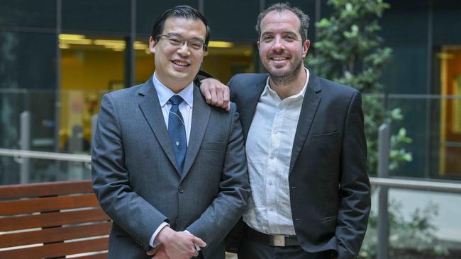 Royal Adelaide Hospital surgeon Diwei Lin meets Ben for the first time since he performed lifesaving surgery on him. Picture: Mark Brake