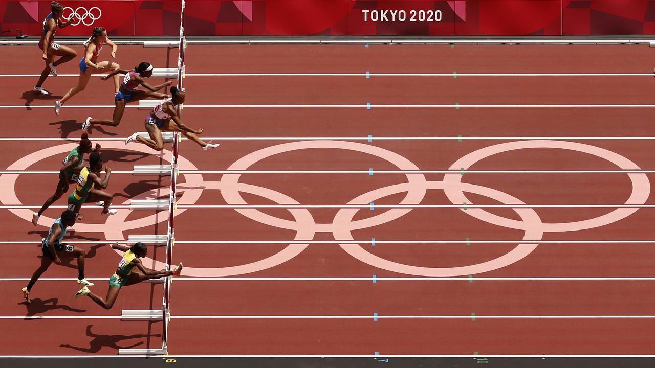 Athletes compete in the Women's 100m Hurdles Final at the Tokyo 2020 Olympic Games. (Photo by Ezra Shaw/Getty Images)