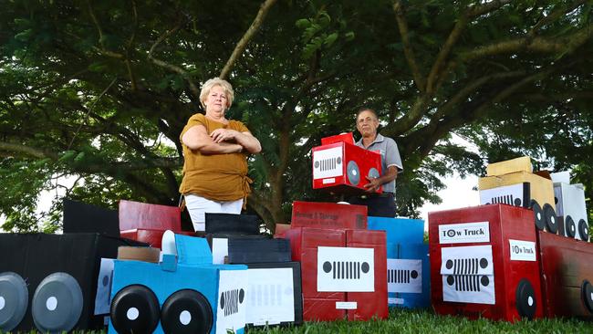 Cairns couple Perri and Phil Conti are fed up with the city's juvenile crime rate and the sheer number of youth stealing cars in Far North Queensland. They have made cardboard box cars to represent the number stolen in Cairns in January, and will place them all in front of Michael Healy's office on Spence Street at an upcoming rally. Picture: Brendan Radke