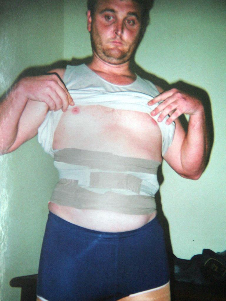 Martin Stephen during his search at Ngurah Rai Airport with heroin found taped to his body. Picture: Supplied