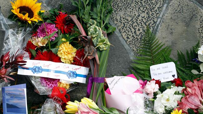 Flowers with messages for the victims of the mosque attacks. Picture: AFP