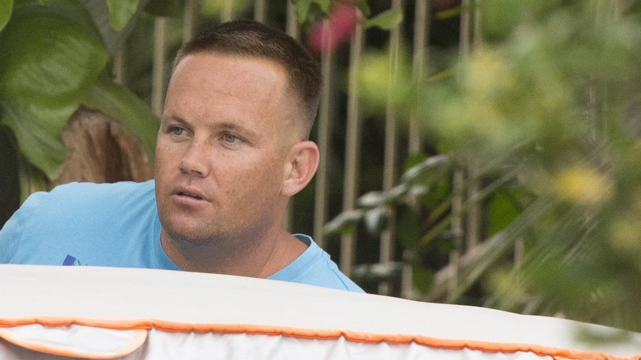 Child killer Matthew Scown steps outside a car briefly before quickly making a getaway at Maroochydore. FILE IMAGE