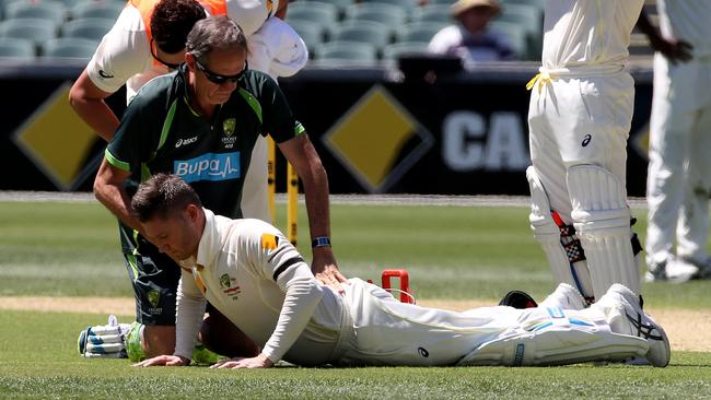 Michael Clarke tries to push through the pain barrier during the Adelaide Oval Test in 2014. Picture: Simon Cross