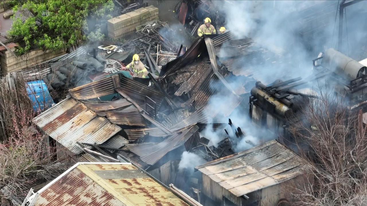 Emergency crews have battled a fierce blaze that forced the closure of a petrol station at Woodville West. Picture: 7NEWS