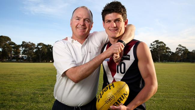 Time to move out, son: Angus Brayshaw with dad Mark Brayshaw before he was drafted. Picture: Brendan Francis