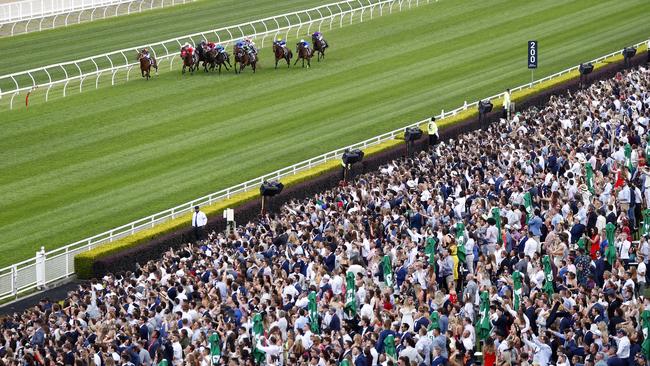 A packed house at Randwick cheers the field home. Picture: Sam Ruttyn