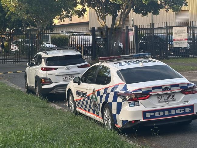 Police on scene at Durack State School where a two-year-old boy was hit by a car today. Picture: Nigel Hallett