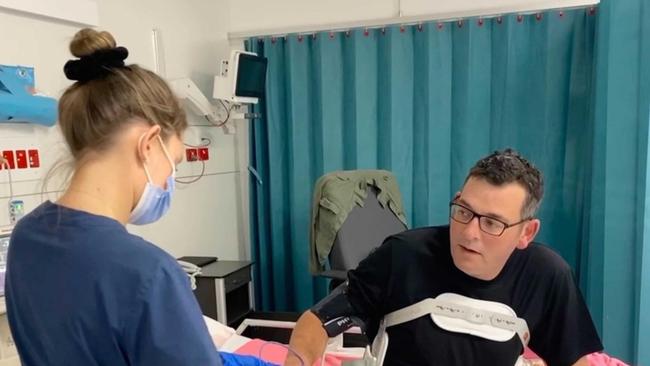 Daniel Andrews in a back brace after he was moved from intensive care.