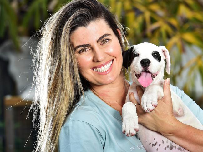 Brooke Winterstein  pictured with a foster puppy ready to be adopted. Picture: Shae Beplate.