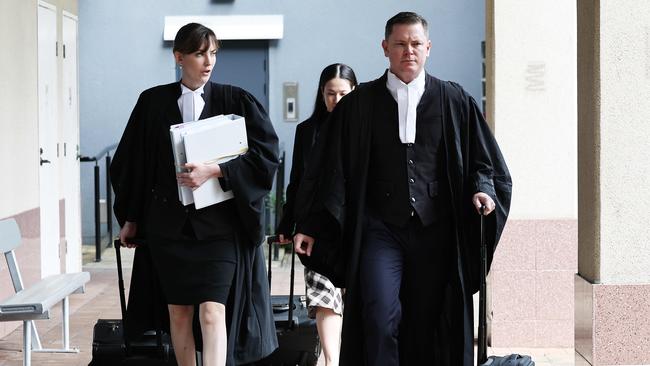 Crown prosecution barristers Hannah McNeale and Nathan Crane entering the Cairns Supreme Court for the trial of Rajwinder Singh, 40, who has pleaded not guilty to murder. Picture: Brendan Radke