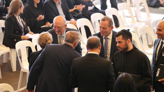 Labor leader Anthony Albanese attends St Charbel’s Good Friday Liturgy in Punchbowl where he shook hands with former Prime Minister Tony Abbott. Picture: Toby Zerna