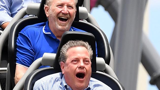 Queensland Opposition Leader Tim Nicholls (front) and Coomera MP Michael Crandon at Movie World before a media conference yesterday. (AAP Image/Dan Peled)