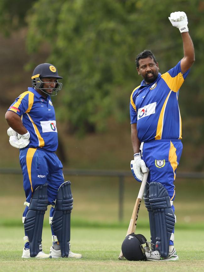 VSDCA: Noble Park’s Janaka Liyanabadalge (right) celebrates his century. Picture: Stuart Milligan