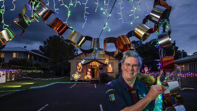 Scouts Queensland Darling Downs assistant region commissioner Barry Keleher with the Christmas lights display at Scouts Darling Downs regional headquarters, Monday, December 6, 2021. Picture: Kevin Farmer