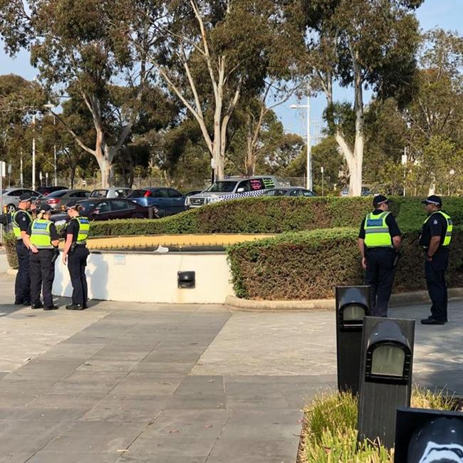 Police outside a December 17 Whittlesea Council meeting.