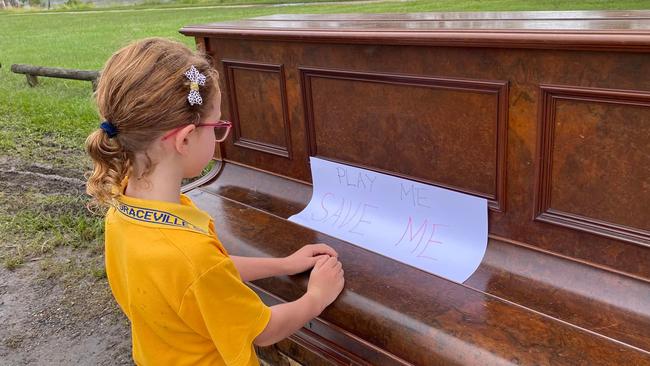 Grace Dixonm 8, plays the piano. Picture; Mary Dixon