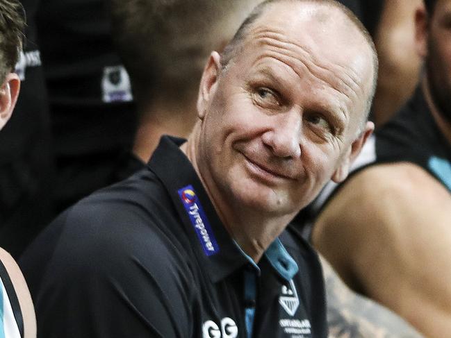 AFL - Port Adelaide Photo Day at Alberton Oval. Tom Jonas and Ken Hinkley looking around while waiting for the official team photo to be taken Picture SARAH REED