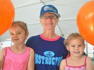 WINTER SWIMMING: Lockyer Valley swimmers Clara Garcia (left) and Layla Gauld (right) are joined by instructor Jan Moy for the World’s Largest Swimming Lesson. Picture: Ali Kuchel