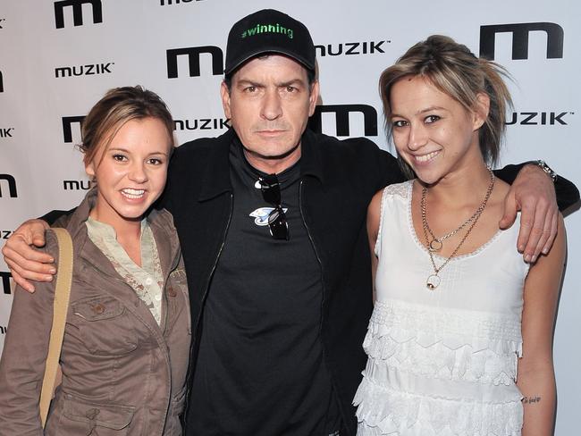 In the past ... Charlie Sheen with his then-girlfrnds Bree Olson and Natalie Kenly in 2011. Picture: Supplied