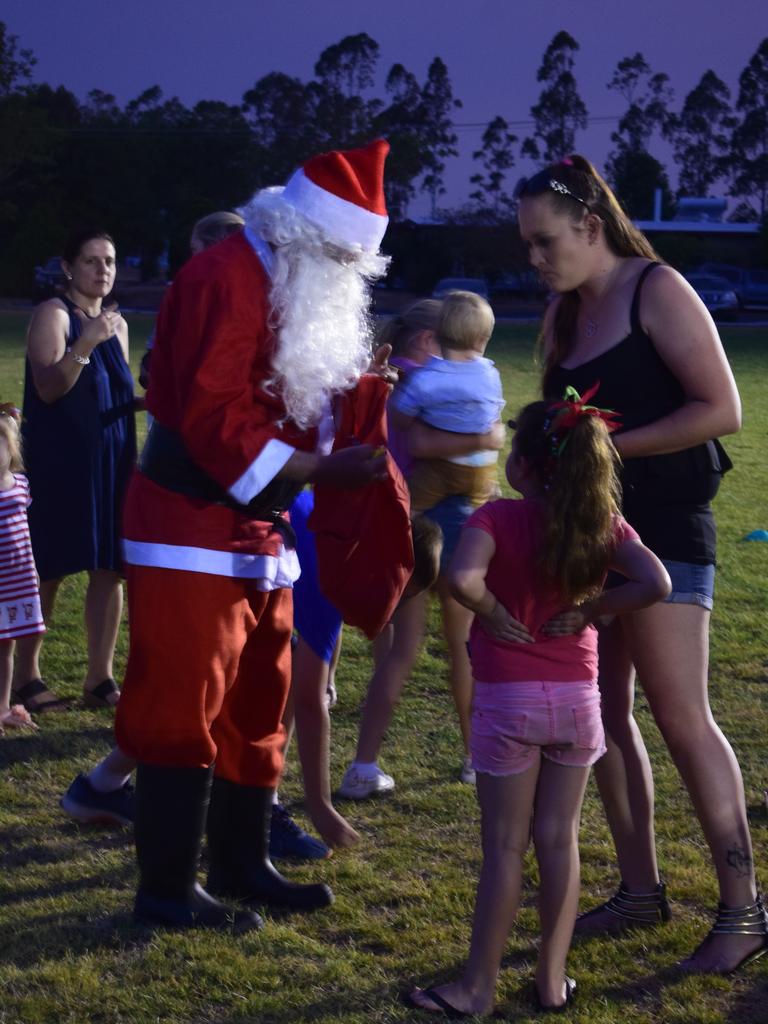 Santa was as popular as ever when he arrived with lollies for the kids.