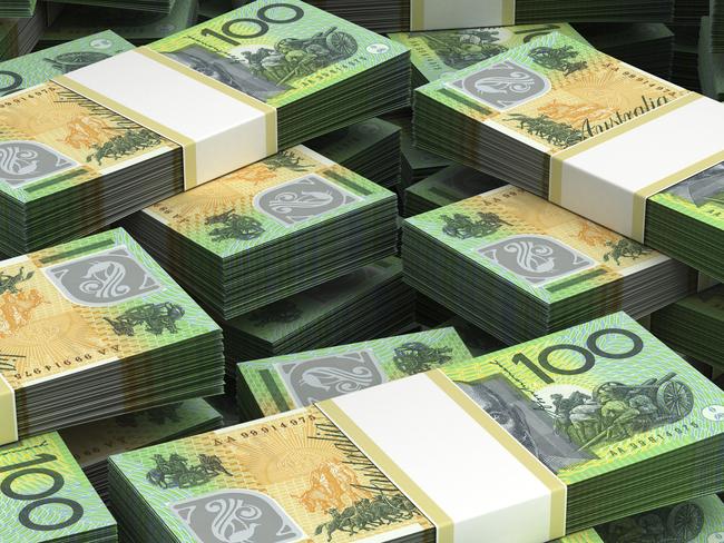 Stack of Australian Dollars. Australian money. $100 bill stacks. Thinkstock