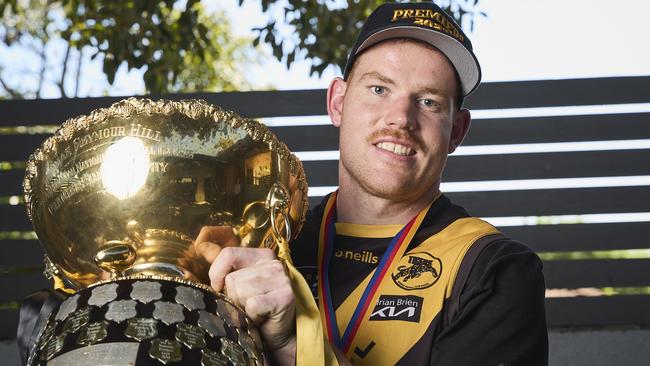 Glenelg’s Toby Pink in celebration mode with the Thomas Seymour Hill premiership trophy after the Tigers beat Sturt in Sunday’s SANFL grand final at Adelaide Oval. Picture: Matt Loxton