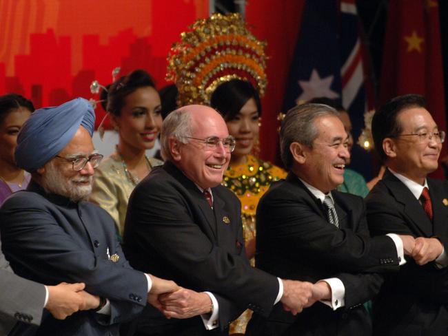 Indian PM Manmohan Singh, Australian counterpart John Howard, Malaysian counterpart Abdullah Badawi &amp; Chinese Premier Wen Jiabao in Kuala Lumpur in 2005 during the (ASEAN) Summit. Picture: News Corp