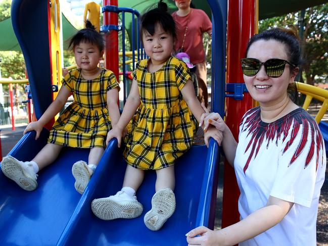 Chinese Australians in Burwood speak to the Daily Telegraph about the rising tensions between the two countries and what it means to them. Grace Zhang with twin girls Elise and Ivana 5.  Picture: Toby Zerna