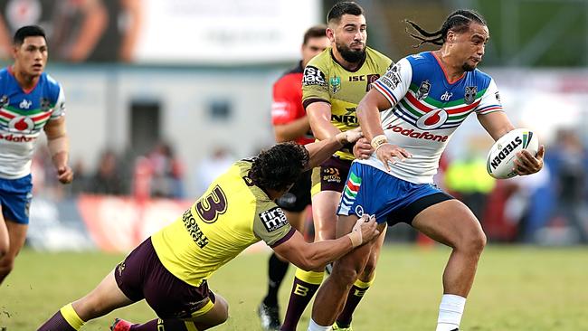 Agnatius Paasi of the Warriors is tackled during the Round 6 match against the Broncos. Photo: Getty Images