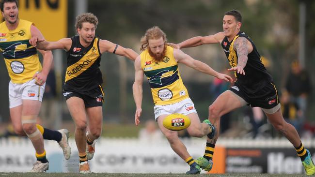 Angus Poole clears for the Eagles in their win over Glenelg. Picture: AAP/Dean Martin