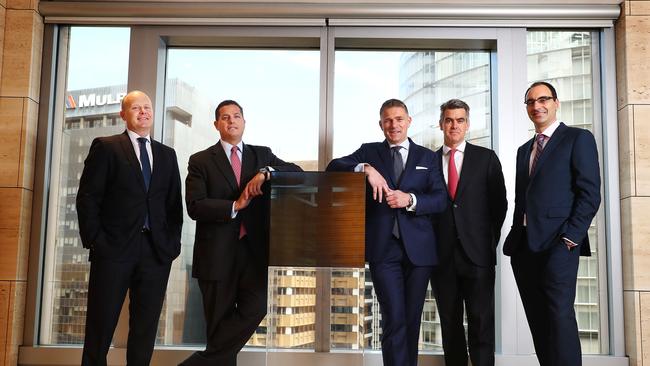 Deal us in: Roundtable participants, from left, UBS's Anthony Sweetman, Bank of America Merrill Lynch's Joe Fayyad, JPMorgan's Paul Uren, Macquarie's Tim Joyce and Gilbert + Tobin’s Costas Condoleon. Picture: John Feder