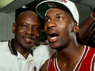 PHOENIX - JUNE 20: Michael Jordan #23 of the Chicago Bulls celebrates winning the NBA Championship with his father after Game Six of the 1993 NBA Finals on June 20, 1993 at th America West Arena in Phoenix, Arizona. The Bulls won 99-98. NOTE TO USER: User expressly acknowledges and agrees that, by downloading and/or using this Photograph, user is consenting to the terms and conditions of the Getty Images License Agreement. Mandatory Copyright Notice: Copyright 1993 NBAE (Photo by Andrew D. Bernstein/NBAE via Getty Images)