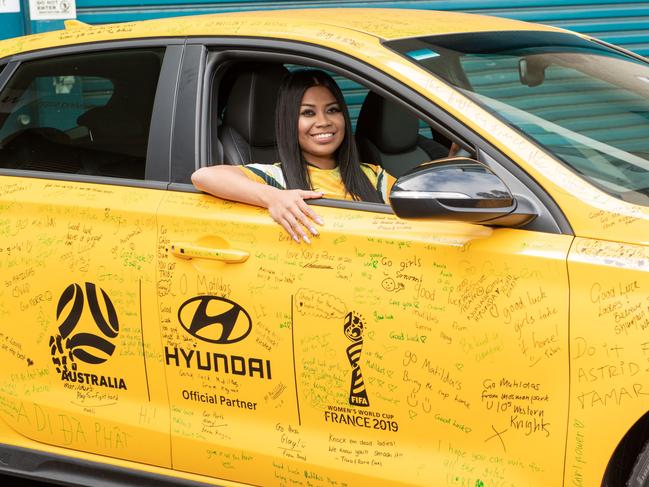 MAFS star Cyrell Paule in the car with the signatures on it. Picture: Supplied