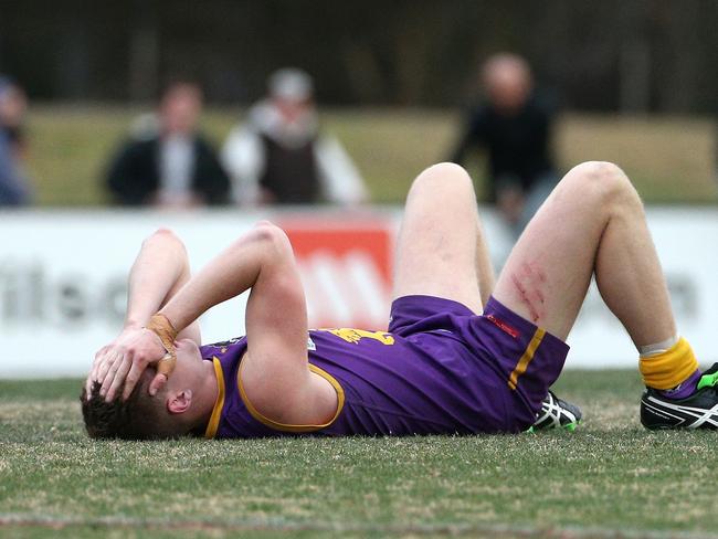 Sam Hibbins of Collegians dejected on the final siren after VAFA (Premier) GF. Picture: Hamish Blair