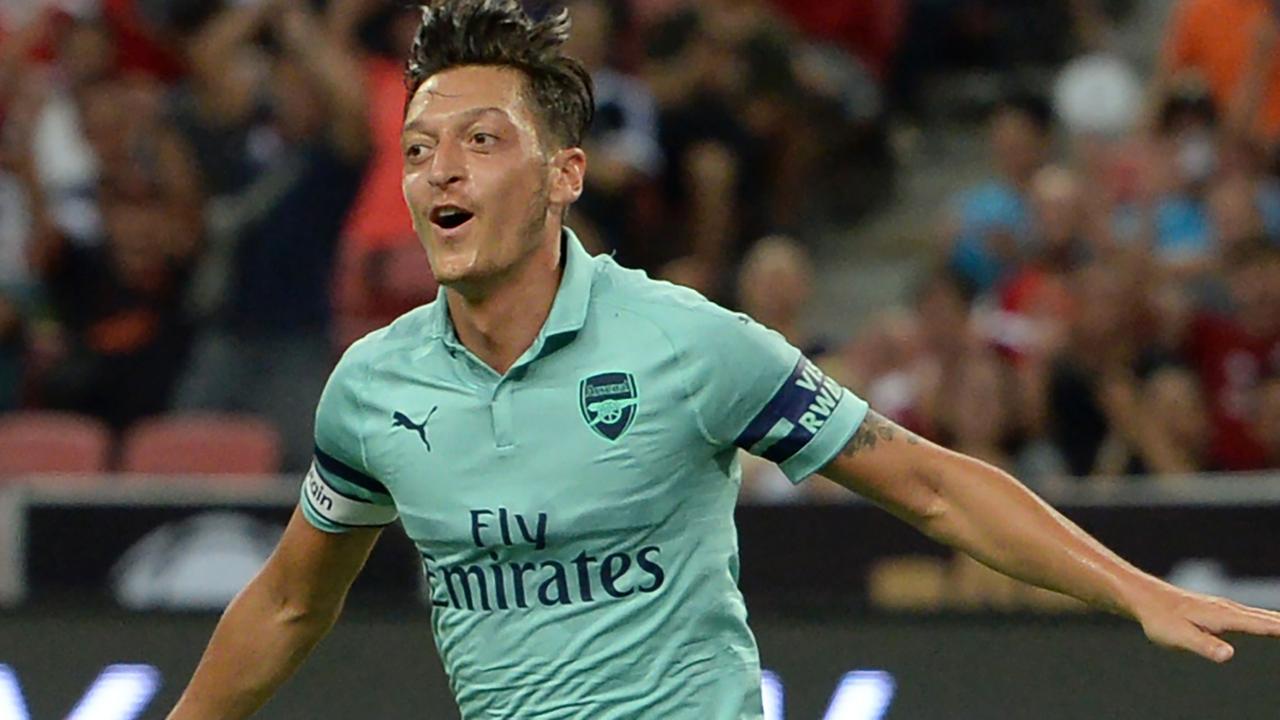 Mesut Ozil led Arsenal to a 5-1 win over PSG.