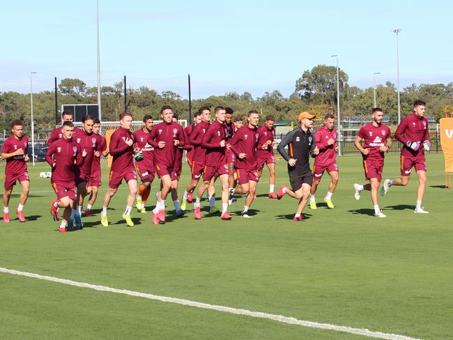 Brisbane Roar players back in training yesterday.