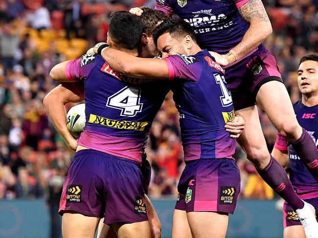 Melbourne Storm or Brisbane Broncos? Your guess is as good as ours. Photo: Bradley Kanaris/Getty Images