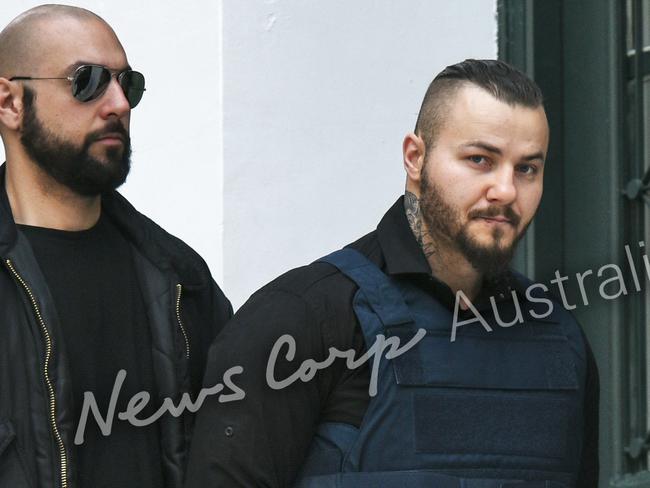 Professional Bulgarian hitman, Yuliyanov J. Raychev Serafim, 31, right, who was charged on April 4 with killing John Macris in Greece. Picture: Nikos Christofakis