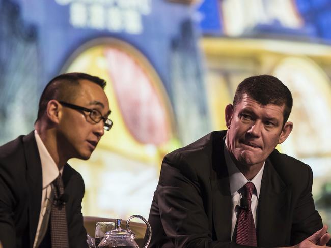 Billionaire Lawrence Ho, chief executive officer and co-chairman of Melco Crown Entertainment Ltd., left, speaks as billionaire James Packer, co-chairman of Melco Crown Entertainment Ltd., looks on during a news conference at Melco's Studio City casino resort in Macau, China, on Tuesday, Oct. 27, 2015. Studio City, which opens today, is the latest test of the former Portuguese colony's ability to attract visitors wanting to play on more than gaming tables and slot machines. Photographer: Justin Chin/Bloomberg *** Local Caption *** Lawrence Ho; James Packer