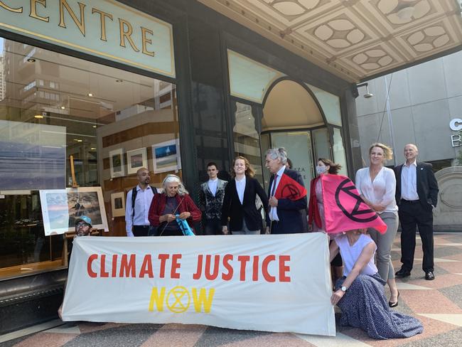 Extinction Rebellion activists posing for a photo outside court on October 12. Picture: Supplied