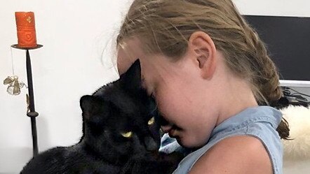 Eleven year old Lilli Ehrlich with now deceased cat Kaiser.