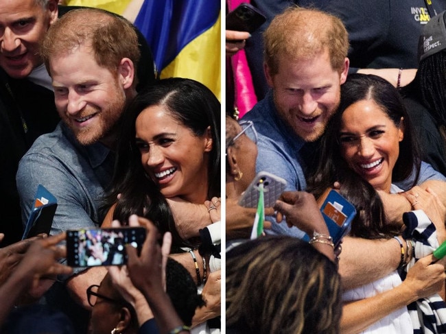 Harry and Meghan have put on a loved-up display at the Invictus Games.