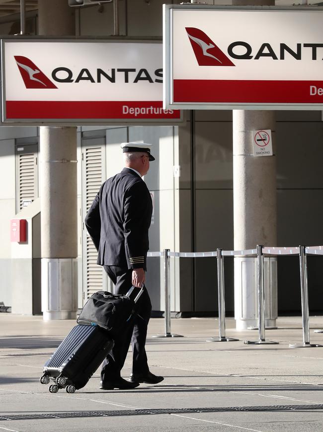 QANTAS pilots and staff at Brisbane airport. Photographer: Liam Kidston.