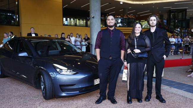 Ethan Parry, Ava Chan and David Lang arrive at the Trinity Bay High School formal evening, held at the Cairns Convention Centre. Picture: Brendan Radke